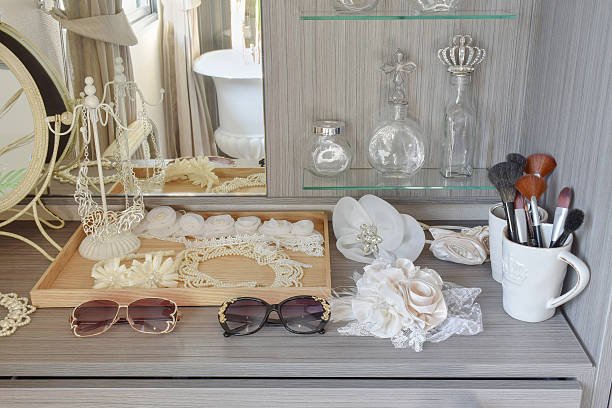 Gray dressing table with accessories in a home interior.