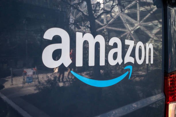 Amazon Prime delivery van parked at The Spheres in Seattle, symbolizing fast delivery of luxe Amazon finds under $30.