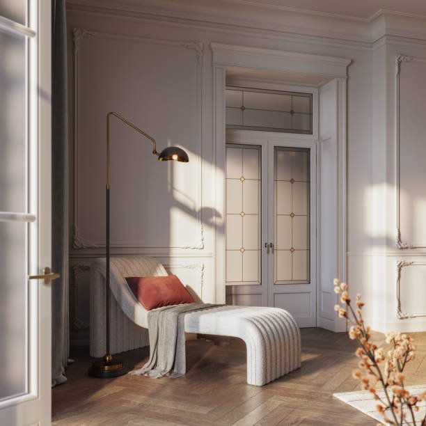 A cozy reading nook with plush seating and warm lighting in a modern bedroom.