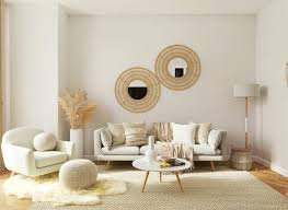Elegant luxury living room with plush velvet sofas, gold accents, and a grand chandelier.