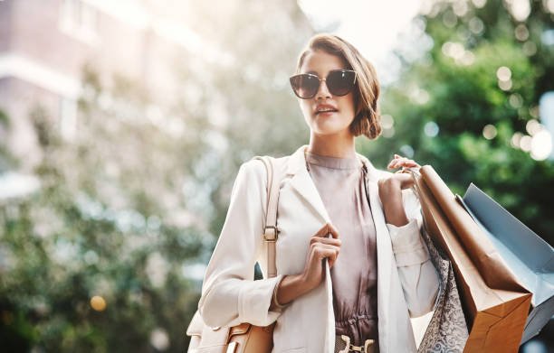 Elegant young woman on a luxury shopping spree.