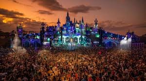 Tomorrowland 2025 with colorful lights, iconic stage, and global festival atmosphere