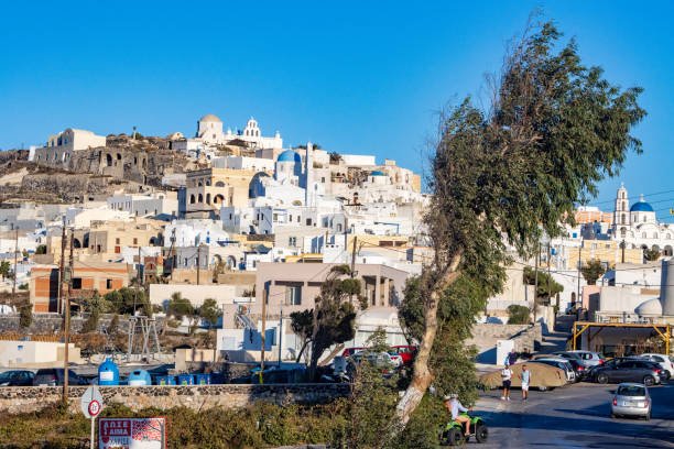 Scenic view of Santorini, Greece, with whitewashed buildings on the hill, typical of Mediterranean Islands to Visit in September